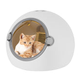 Cat peeking out from a round white pet door with a visible brand logo.