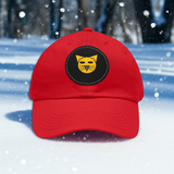 Red cap with a cat logo on a snowy background
